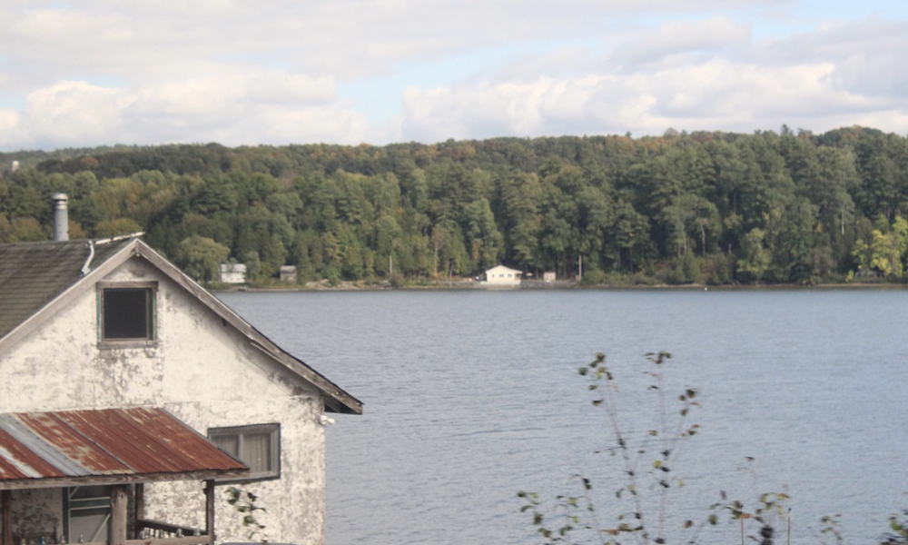 Lake as seen from window of passenger car