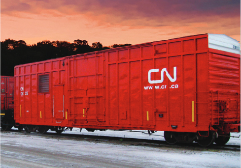 Red box car with vents on one side