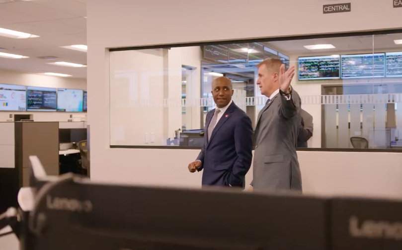 Two men in office building