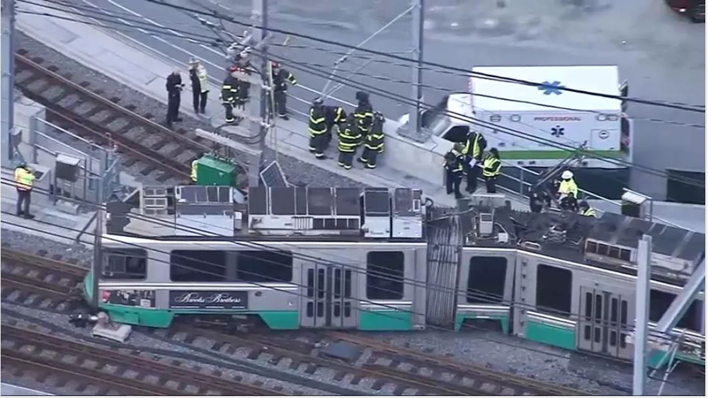 Aerial view of derailed light rail trainset