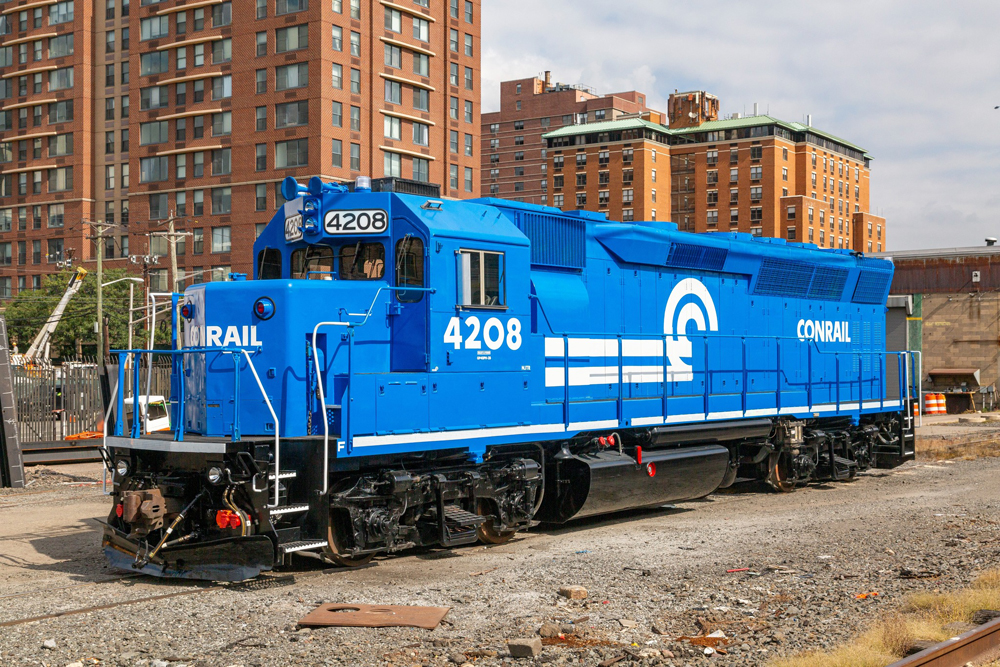 Blue diesel locomotive with white lettering