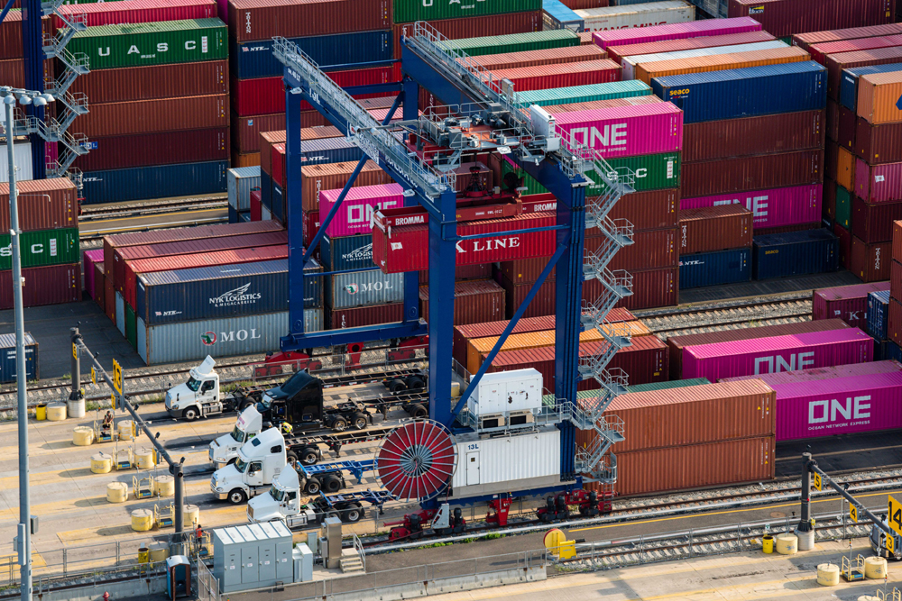 Aerial view of trucks and containers at port