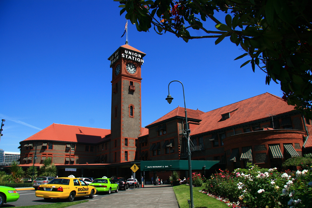 Exterior of railroad station with prominent clock tower