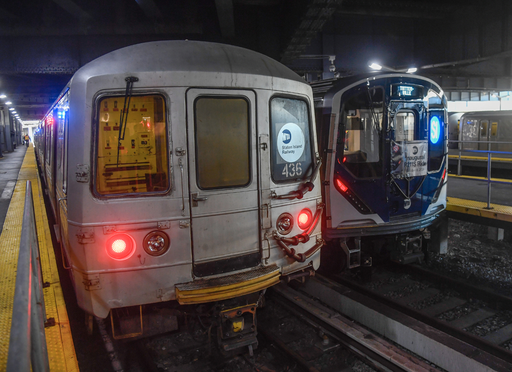 New and old Staten Island Railway trains are side by side at a station