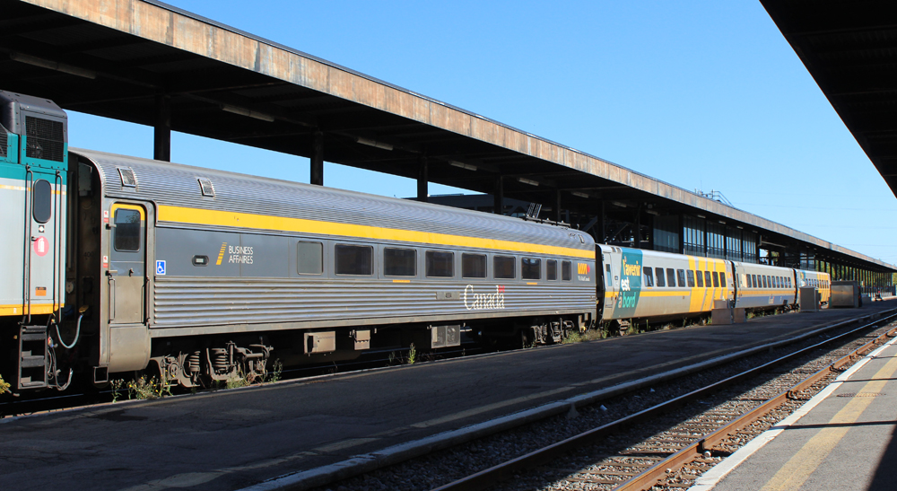 Four passenger cars at station