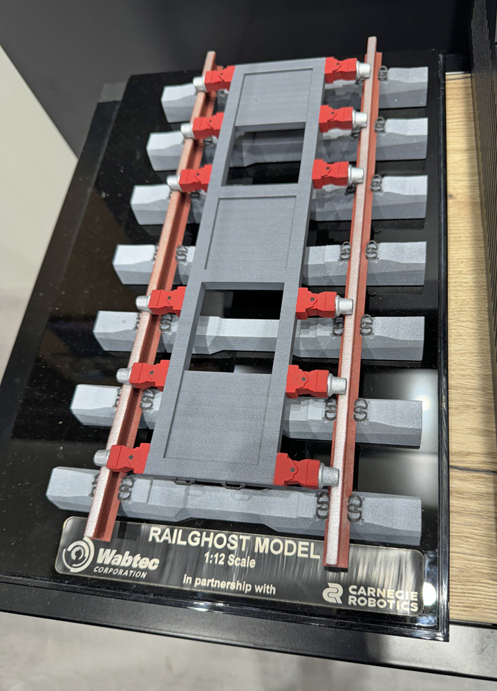 Model of gray "robotic sled" for wheel inspections