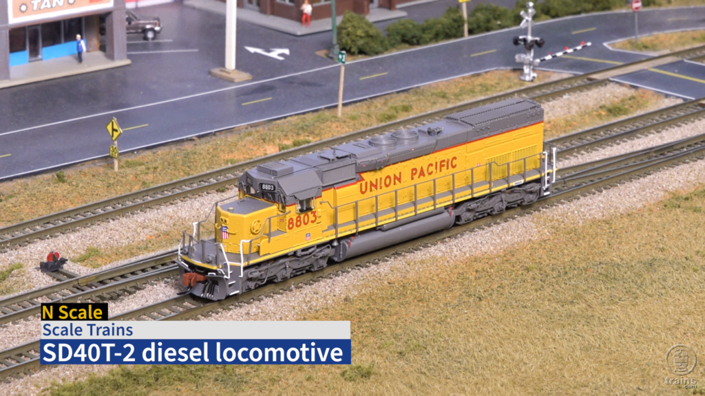 Title screen from product review video showing N scale diesel painted yellow and gray.