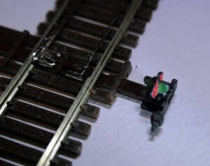 N scale turnout with painted switch stand installed