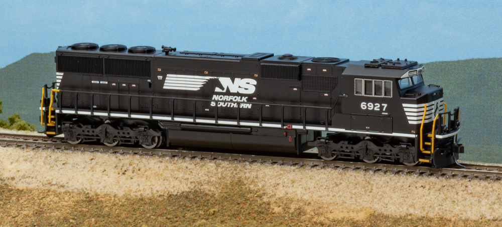 Color photo of N scale diesel on scenic base.