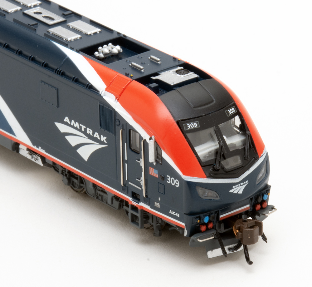 Color photo showing front of N scale streamlined diesel.