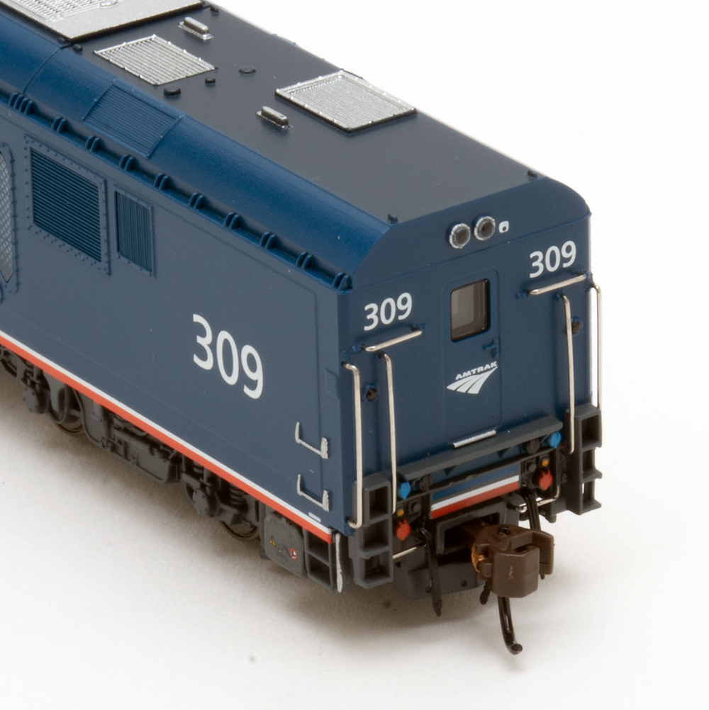 Color photo showing rear of modern N scale passenger diesel.