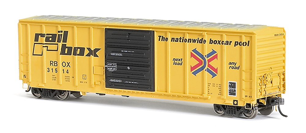 Color photo of HO scale boxcar painted yellow, black, and aluminum.