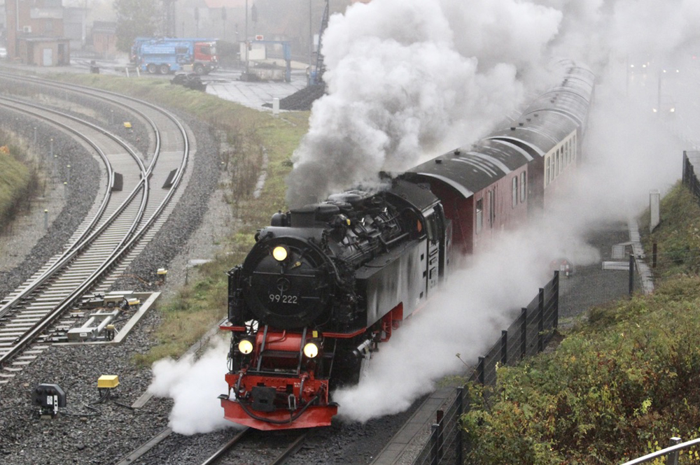 Overhead view of steam-powered passenger train