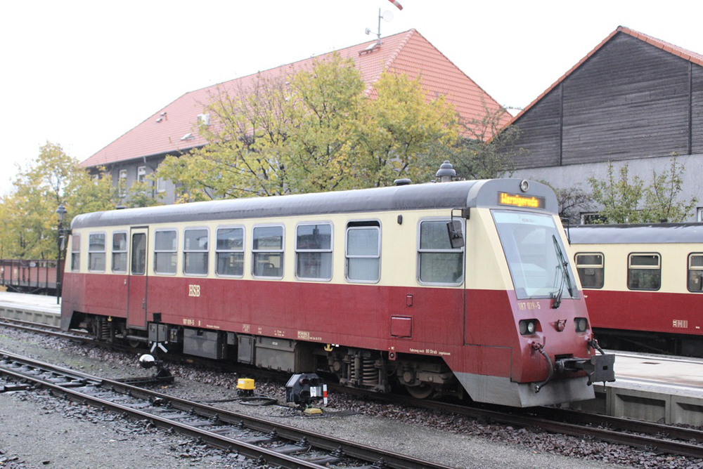 Red and creme railbus at station