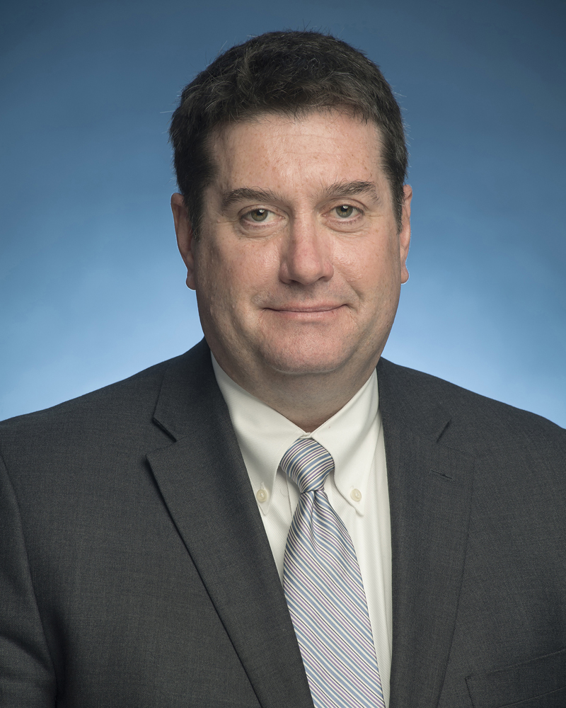 Head shot of man in suit