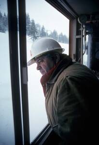 "The Bear" Jim Mahon in white hard hat looking out window