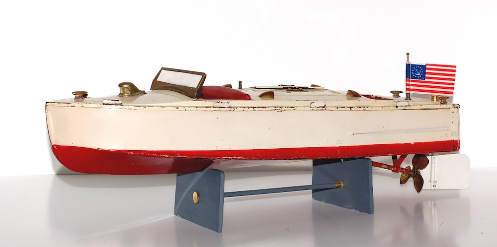 toy boat on stand