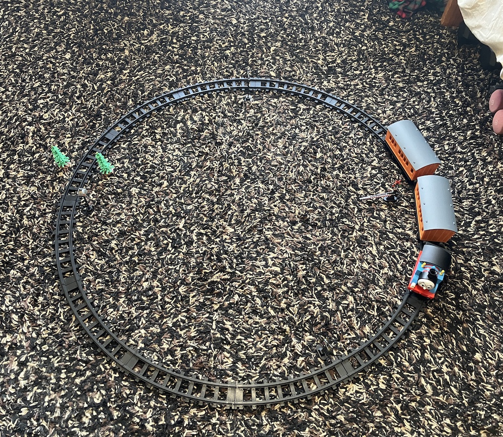 circle of track on carpeting; Lionel Thomas and Friends Battery Operated Train set