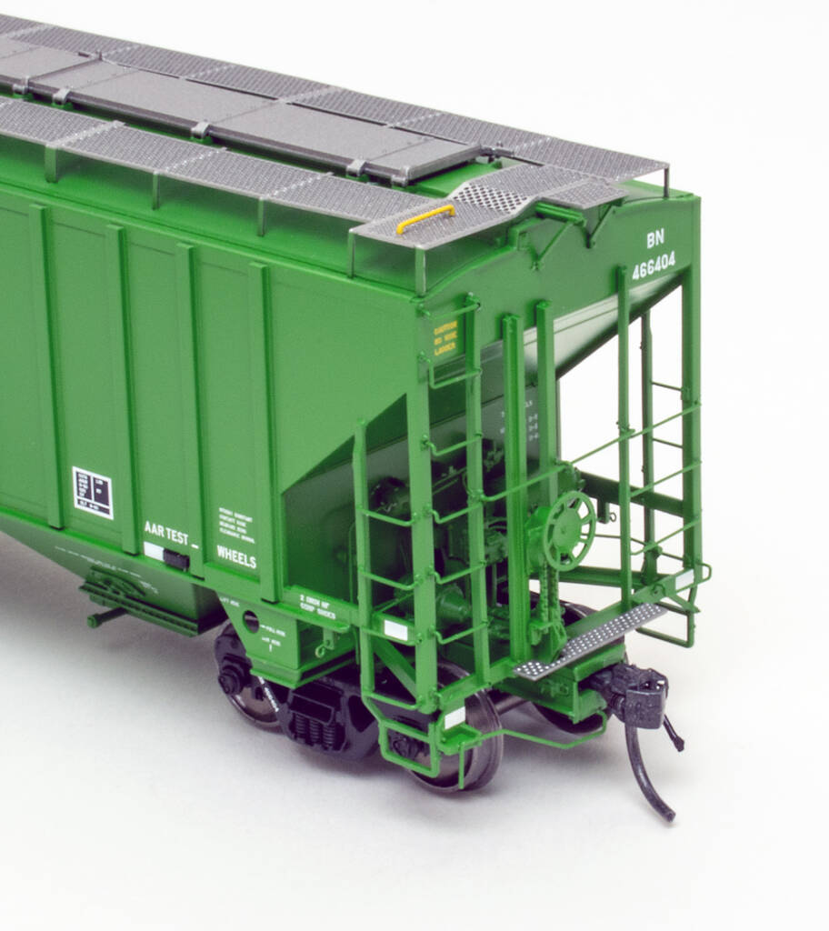 Color photo showing B end of HO scale covered hopper