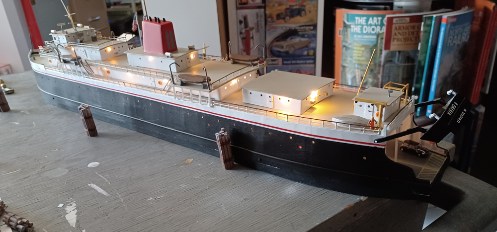 Color photo showing N scale carferry with lights.