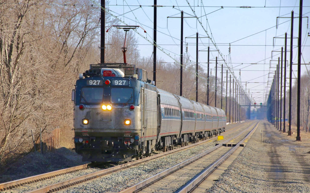 Electric locomotive pulling Amtrak train