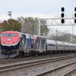 Single-level, long-distance passenger train on multi-track main line