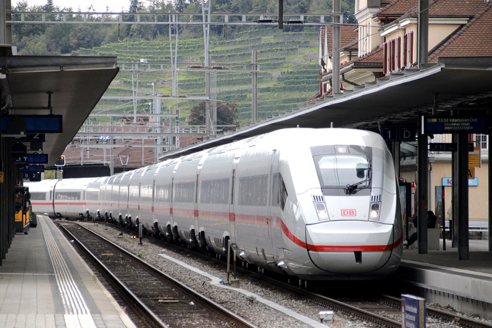 White high speed train at station