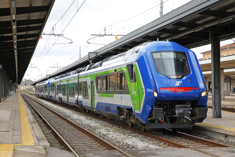 Blue, green, and white multiple-unit passenger trainset