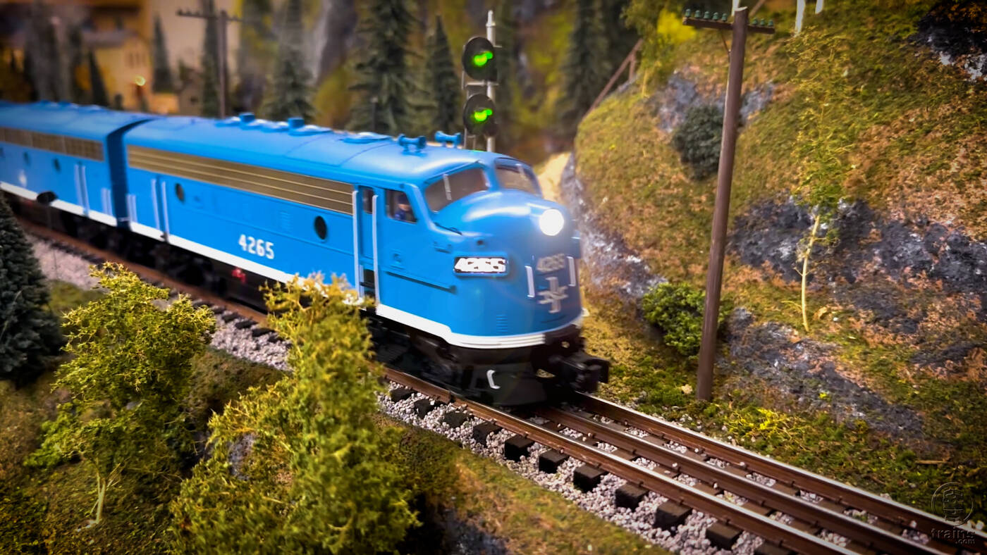 blue model train on layout