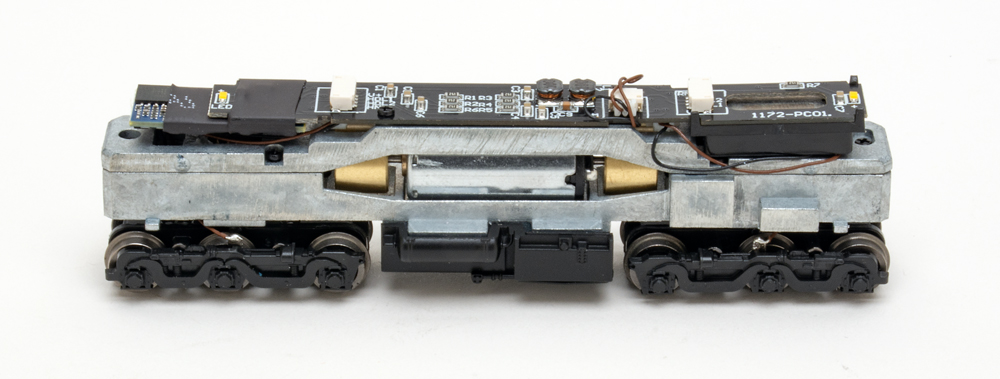 Color photo showing mechanism of N scale diesel locomotive.