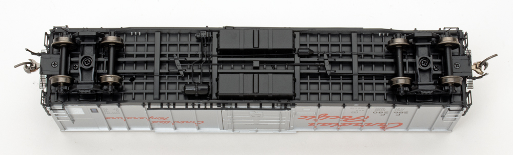 Color photo showing underbody of HO scale freight car