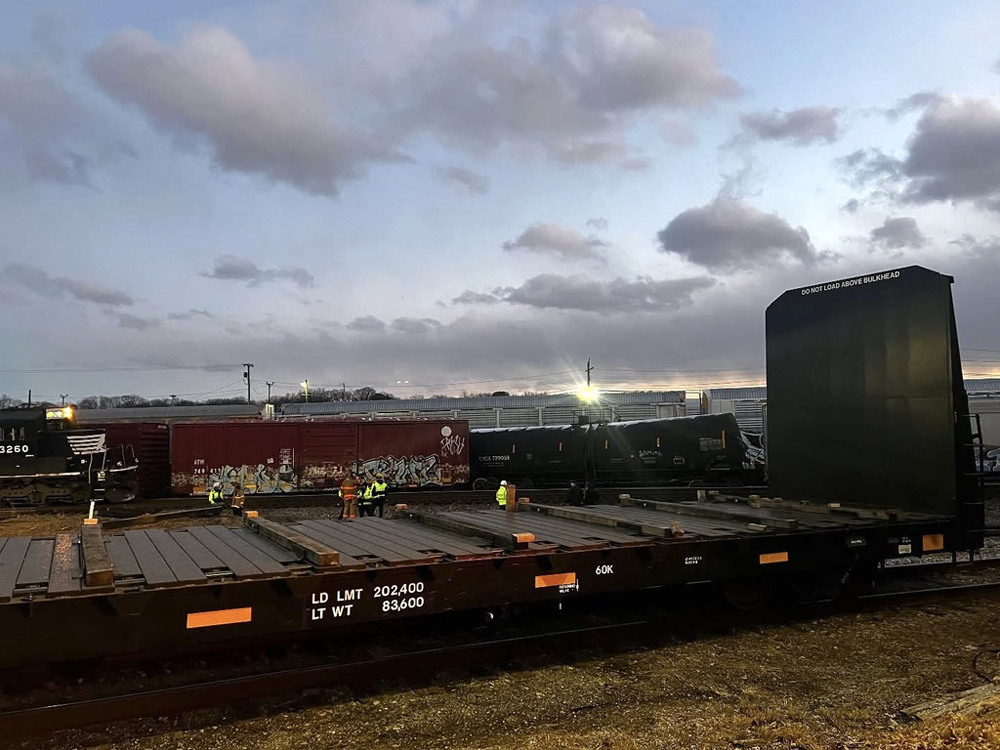 Derailed freight cars in twliight