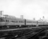 Streamlined stainless steel Burlington Northern passenger trains with three dome cars