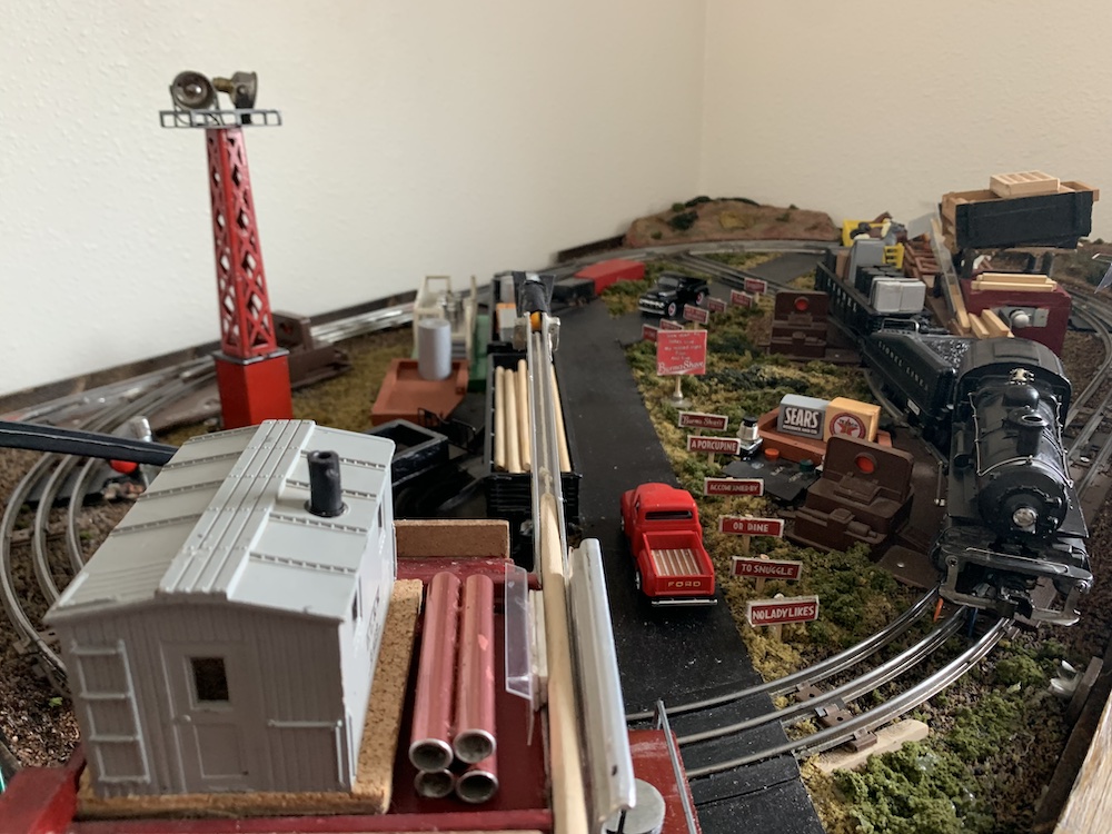 corner of toy train layout; Use castoffs and parts to build something new