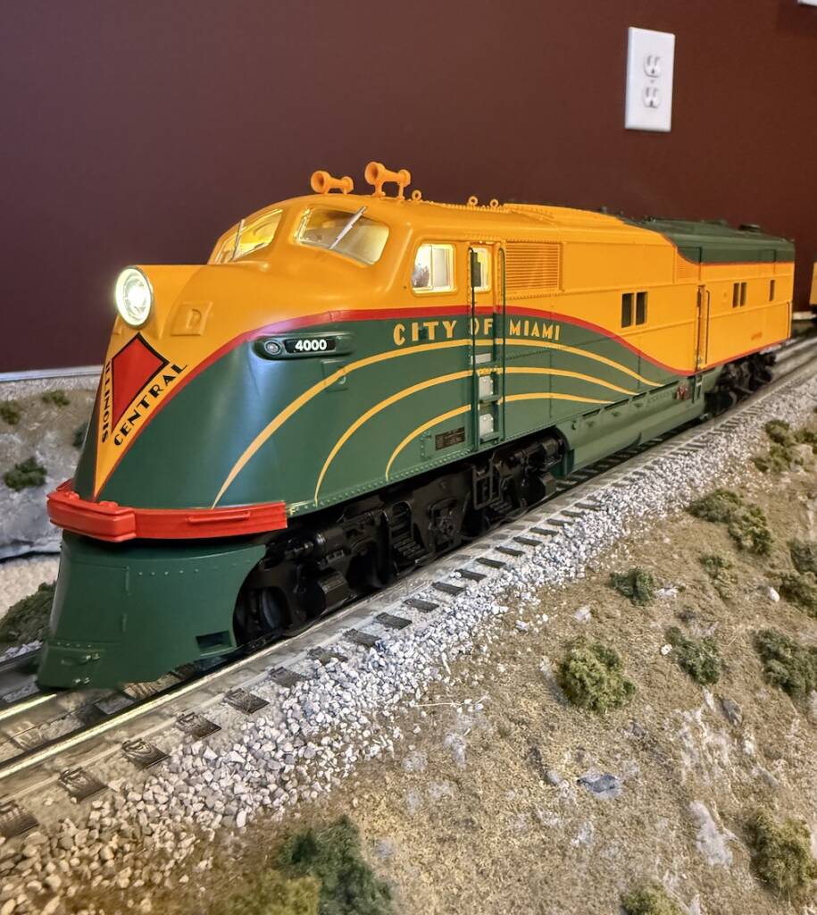 nose of green and yellow model train