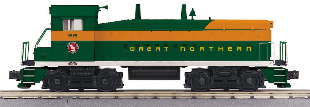 green and orange model locomotive