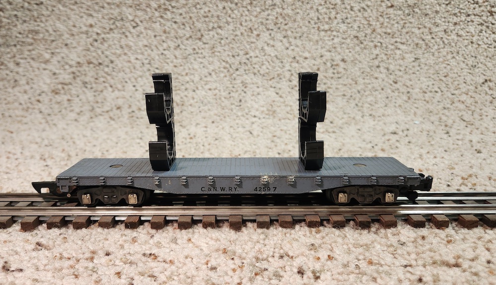 flatcar with four pipe straps glued on top