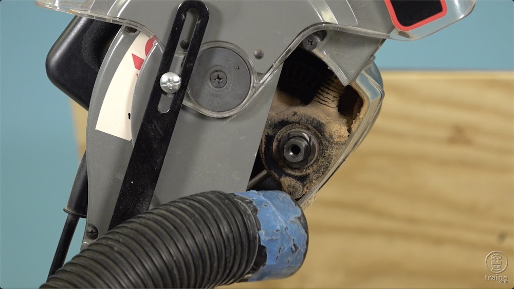 Saw dust inside a circular saw.