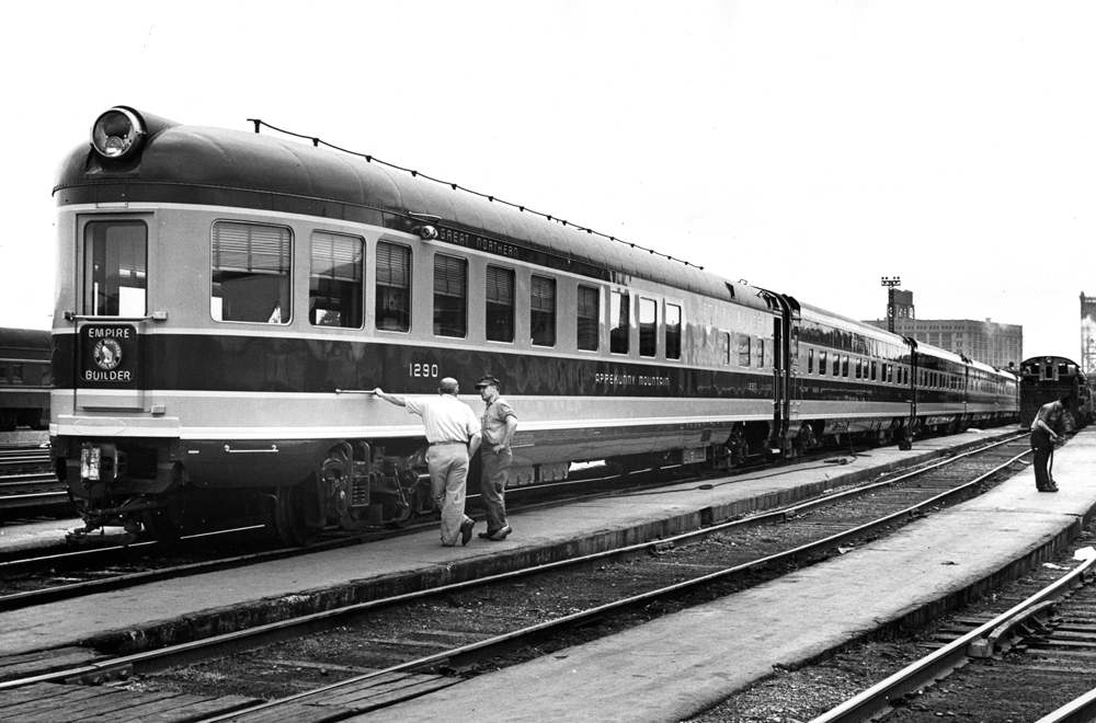 Black-and-white photo of lightweight passenger train.