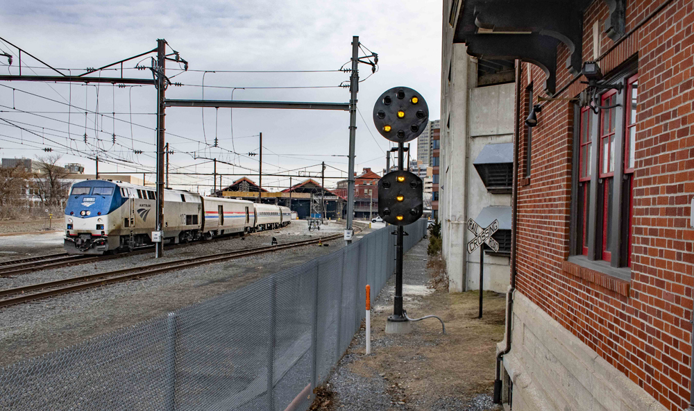 Train passes three-position light signal 