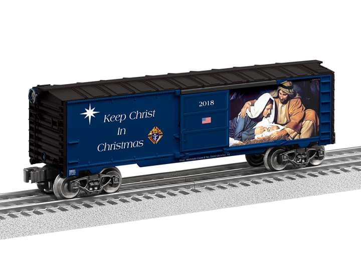 blue boxcar with nativity scene