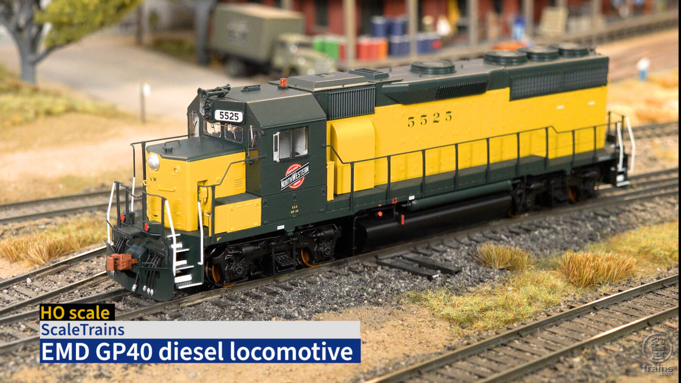 Screen shot from product review video with green and yellow HO scale diesel and title bar in lower left corner