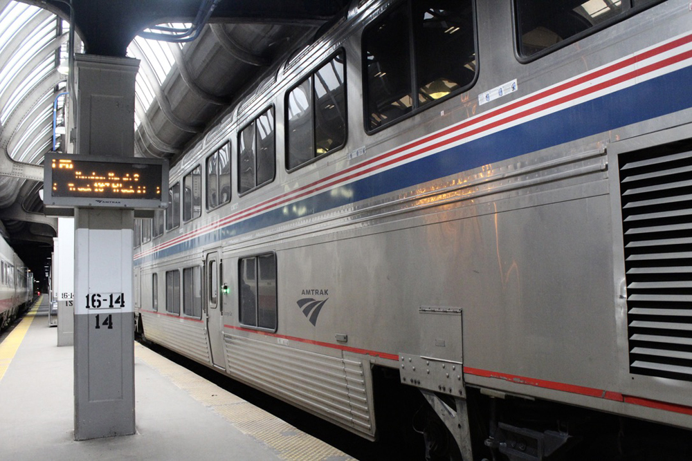 Passenger car under roof in station