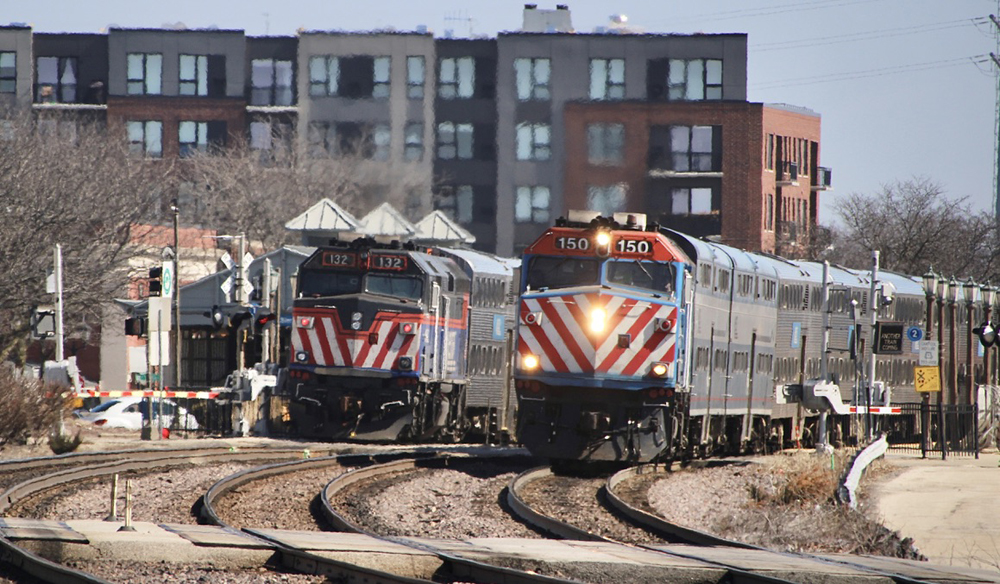 Two commuter trains meet at station